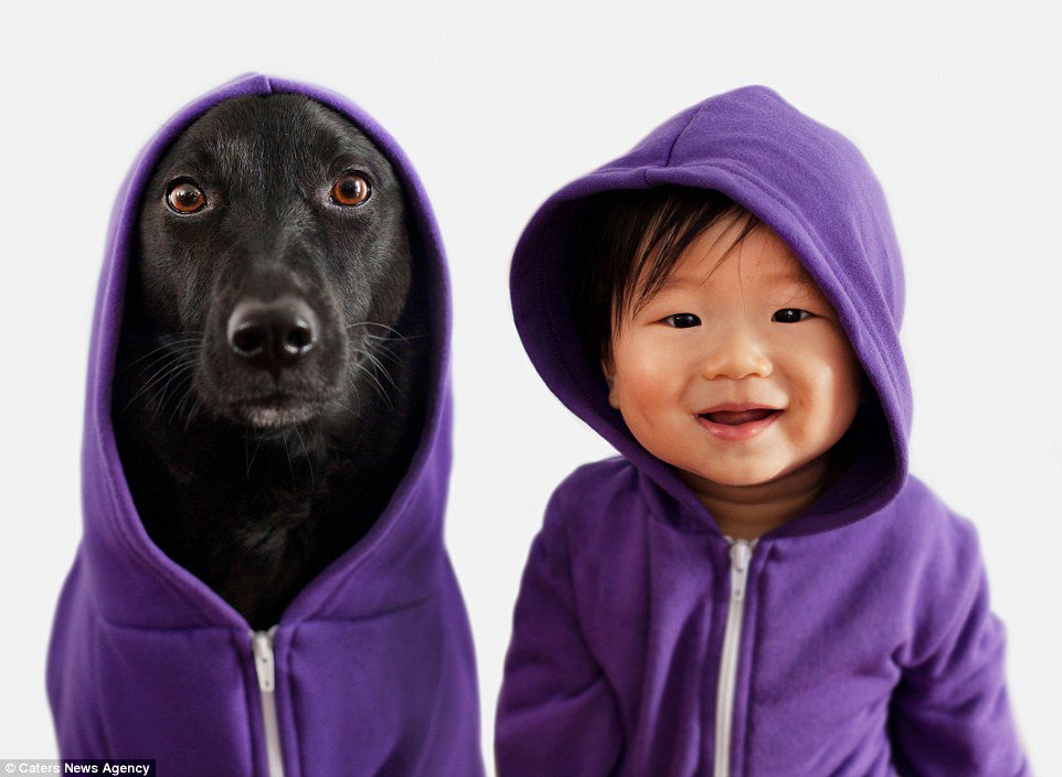 25F0C75D00000578-2963899-The_duo_do_casual_style_in_matching_purple_hooded_sweatshirts-a-76_1424626414397